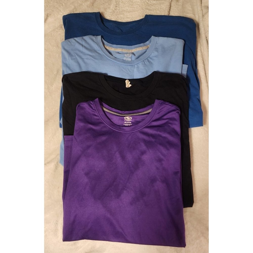 Lot of 4 mens 2xl t shirts small hole on black and sm stain on light blue